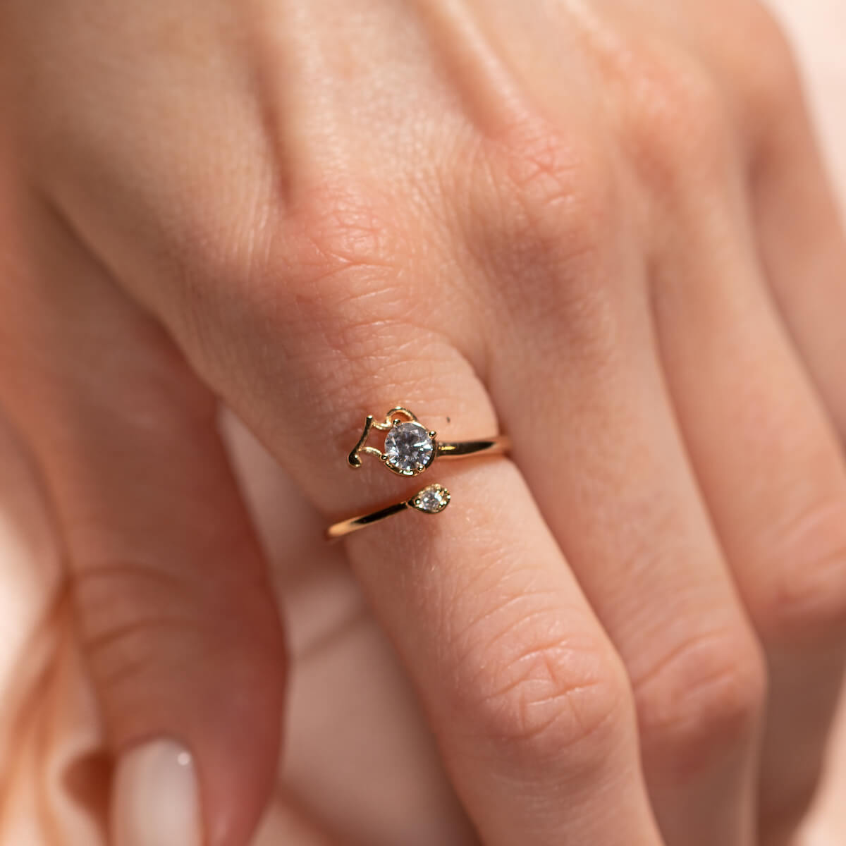 Ring with a round crystal