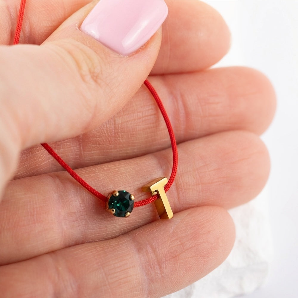 Sarkanais aizsardzības diedziņš ar burtiņu rozā