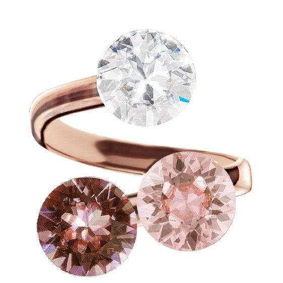 Rosegold gredzens ar gaiši rozā, caurspīdīgu un rozganīgi violetu kristālu